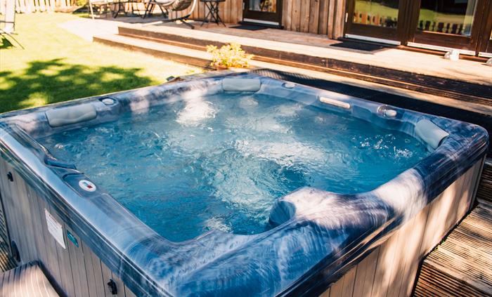 Private spa hot tub located just outside your Lodge.